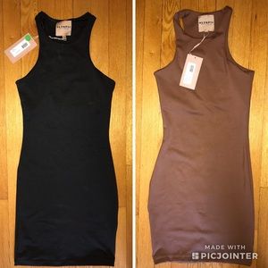 SOLD Never worn! Racer neckline isn’t for me